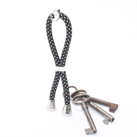 Reflektierender Schlüsselanhänger mit silbernem Slider und Endstücken.